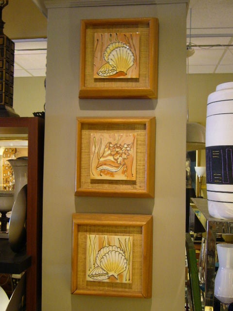 ...SOLD FEBRUARY 2012...Delightful grouping of three Seashell themed glazed tiles by noted tile artist Harris G. Strong.  Mounted shadowbox style over grasscloth with thick cerused oak frames.  Scallops and conchs!  Harris Strong label.  Hang