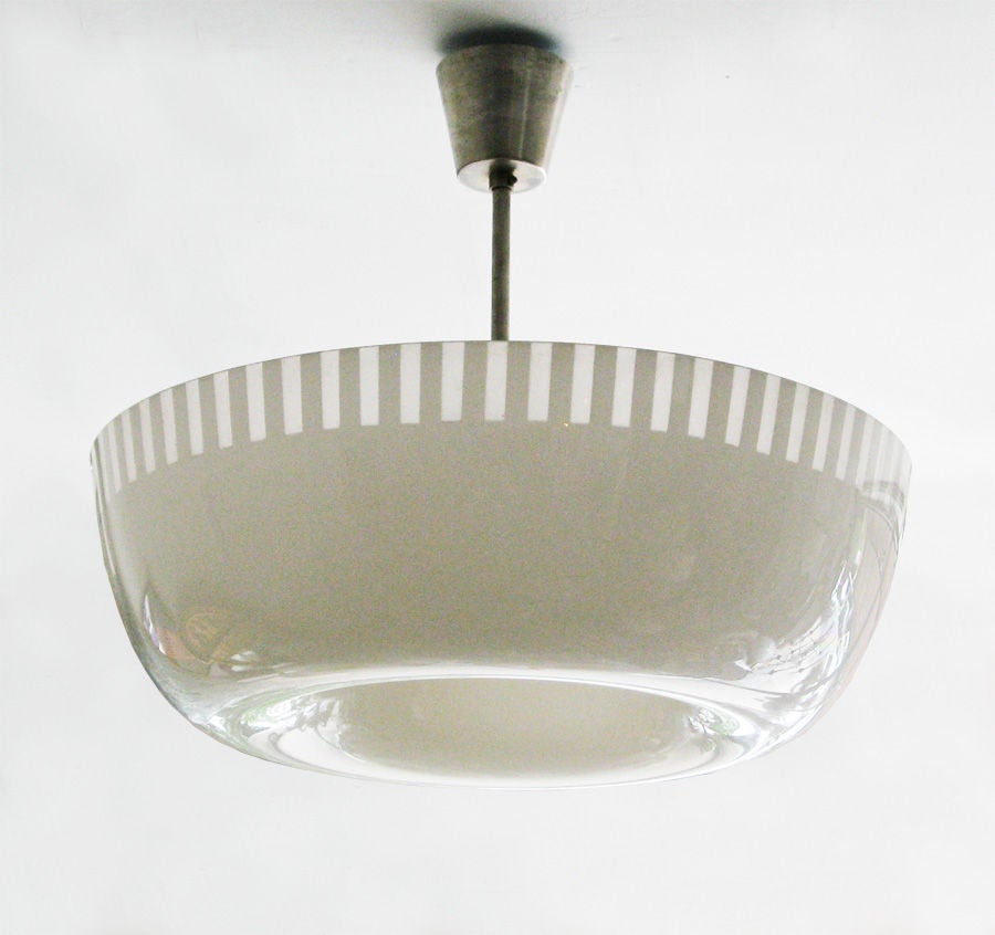 Swedish Art Deco Bohlmans fixture with large white glass shade.