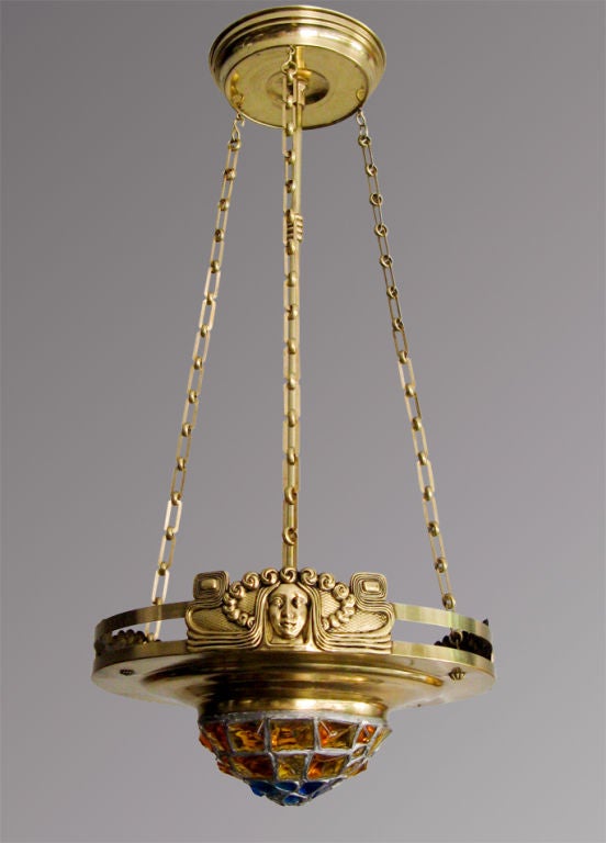 Swedish Art Nouveau "Jugend" chandelier brass and leaded glass.