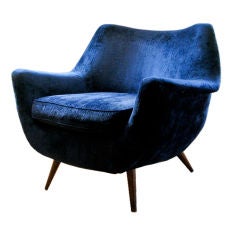 Extremely chic and curvaceous Italian mid-century lounge chair.