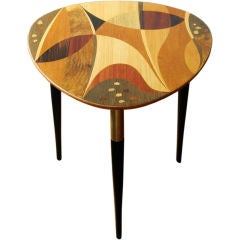 Swedish mid-century occasional table with exotic wood marquetry.