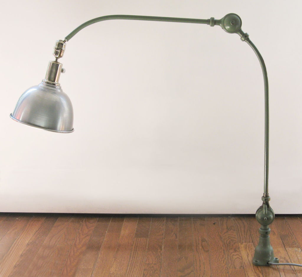 BZ model articulate arm lamp designed by Johan Petter Johansson for Triplex, Sweden, circa 1930. Original painted lamp body mounts with screws (three screw holes on base) polished aluminum shade and chromed metal ball joint allows for a variety of