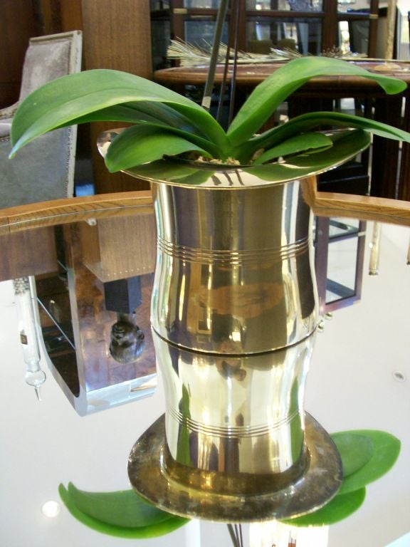 A fantastic planter as shown, beautifully polished brass with simple etched details.  Perfect for orchids!<br />
<br />
AOL (America Online) users may experience difficulties sending emails to us or receiving emails from us. If you have made an