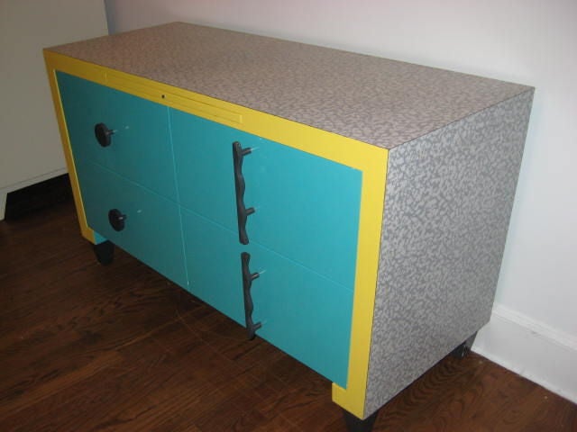 Memphis style cabinet with drawers.  Great storage.
