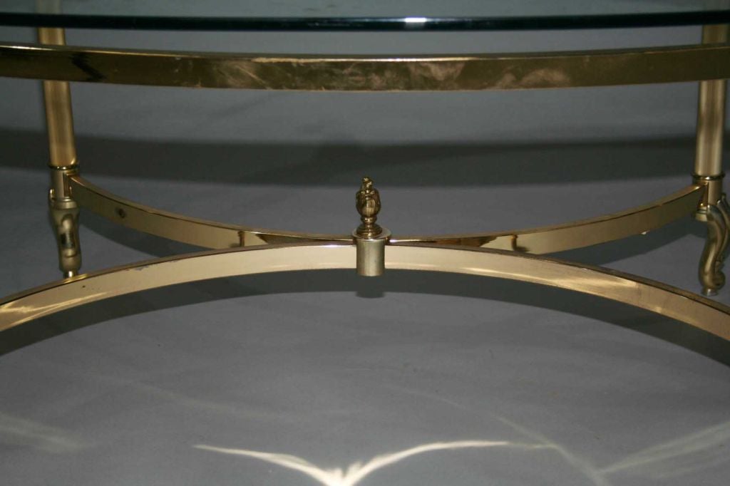 oval glass and brass coffee table
