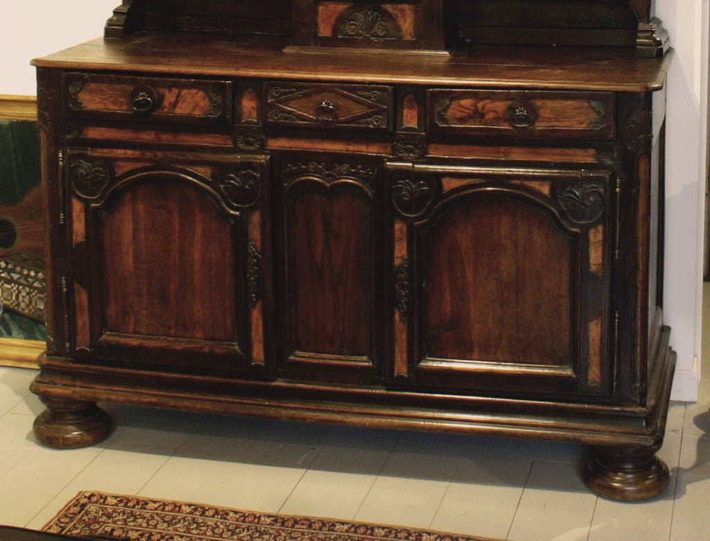 A Rare French Elm, Walnut and Pearwood 

Stepback Cupboard with Clock 

From Bresse Region of France

18th Century

Height 101 in.  Width 59 in. Depth 24 in.