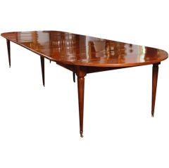 Antique A Louis XVI Faded Mahogany Round Extending Dining Table