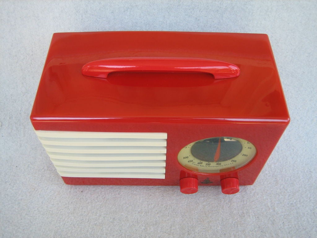 Out of an estate collection is this 1940 Red, White and Blue Emerson Patriot Radio Model 400 designed by Norman Bel Geddes, and issued to commemorate the 25th anniversary of Emerson Radio. The “Flag” inspired design by Norman Bel Geddes was a