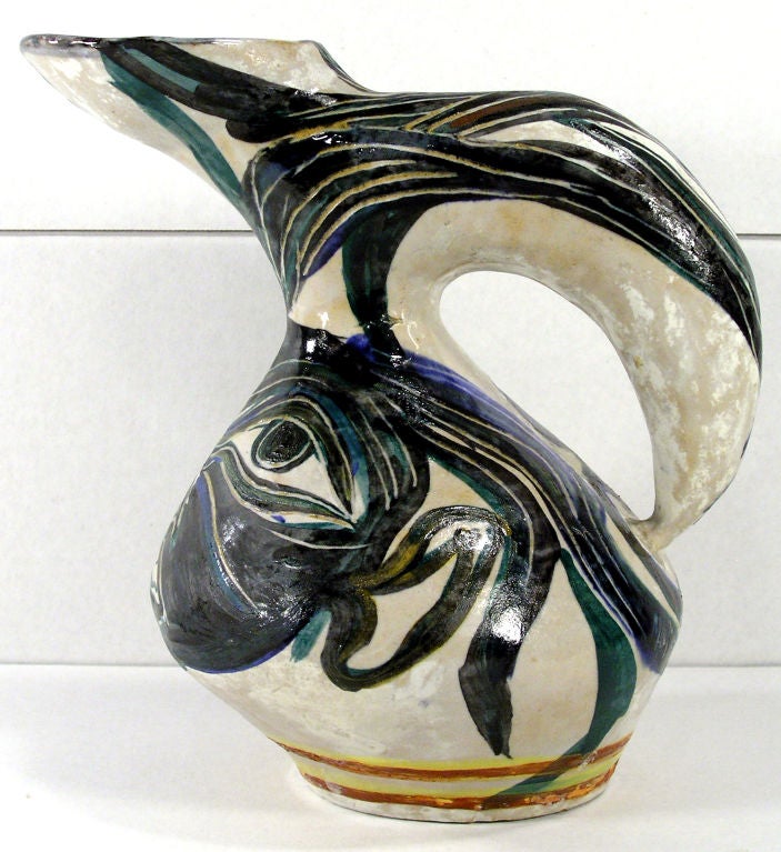 Unique Salvatore Meli Hand-Glazed Italian Mid-Century Modern Earthenware Pitcher from 1955 measuring 8” wide x 6” deep x 8.5” tall. Top side of base is signed Meli 55 Roma.