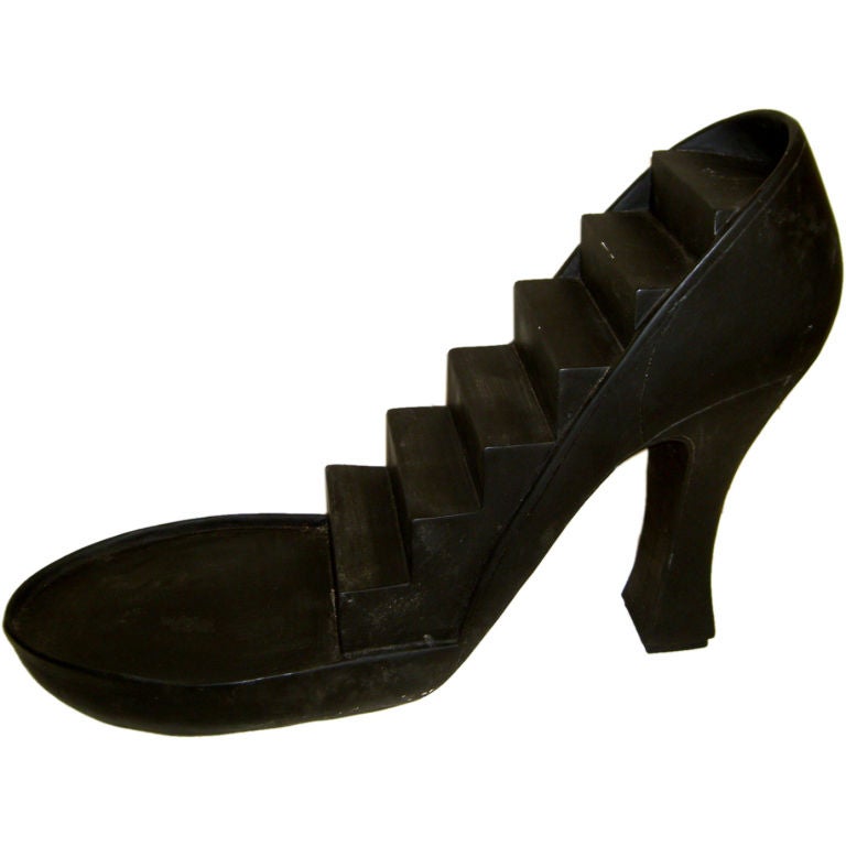 Nice large 1980's store display of a stepped shoe cast in resin