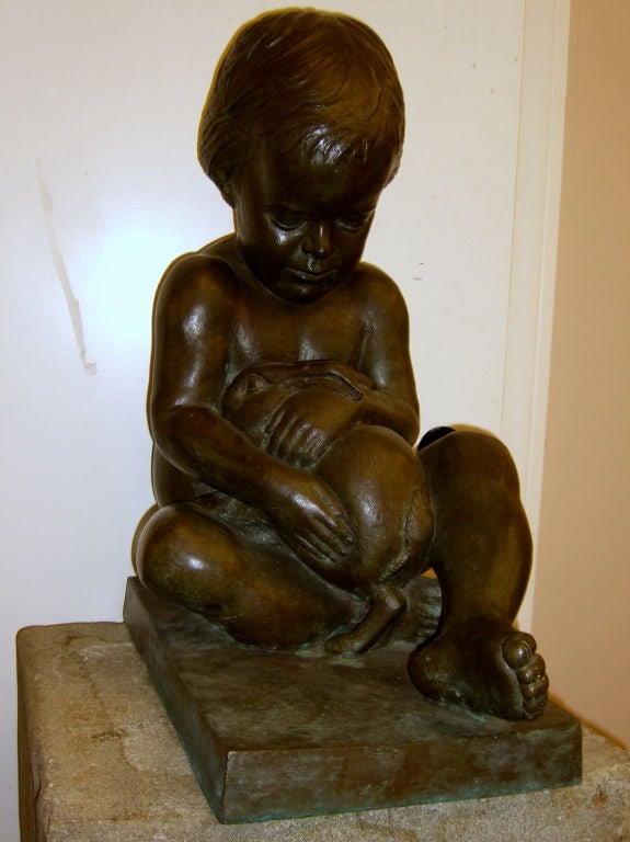 A wonderful and extremely detailed bronze of a girl holding a bunny by the noted American Artist Edward Fenno Hoffman III. It is signed and dated 1977 and also numbered 4/10. It is pictured on the title page of mr Hoffman's book as works on the