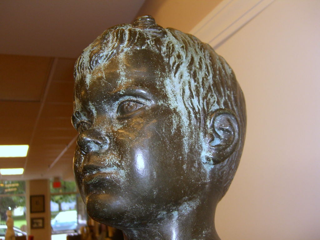 A wonderful statue with great patina by the noted artist Edward Fenno Hoffman III who died in 1991. This sculpture is pictured in his book and titled boy with turtle and dated 1952 in the book. This bronze was cast two years later and is dated and