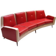Sofa in red and cream-colored vinyl