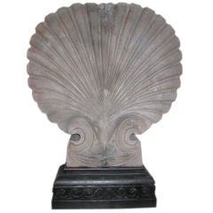 A large Carved Wood Shell