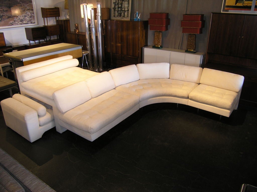 The Omnibus sofa, first designed in the late 1960's, would become one of the hallmarks of Kagan's career. Comprised of modular, multi-directional and interchangeable sections, it creates true interior landscapes with a hi-lo perch that offers