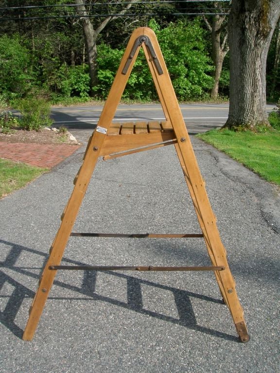 Double sided platform step ladder with wheels and original hardware. 50 1/2