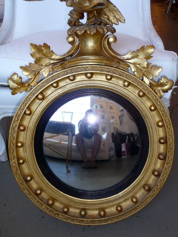 French 18th Century Giltwood Convex Mirror w/ Eagle For Sale