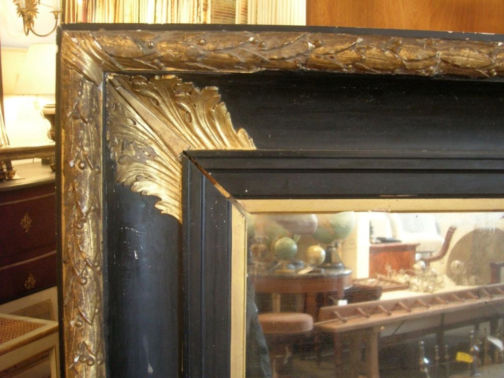 French 19th Century Large Gilded and Ebonized Mirror For Sale