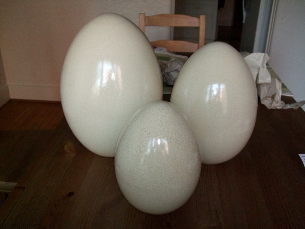 Set of 3 Porcelain eggs with a speckled glazed finish. Price is for the set. <br />
12 1/2 h x 8 dia large <br />
11 h x 6.5 dia Med. <br />
9 h x 5 dia small