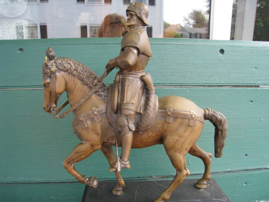 bronze equestrian statue on blank marble plinth