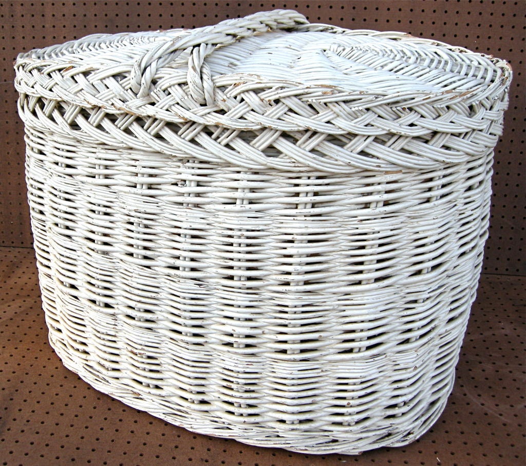 Reminiscent of summers gone by, this truly beautiful overscale wicker basket is a true standout for any room setting. It's intriguing combination of weaving and patterns provide maximum visual and aesthetic appeal.