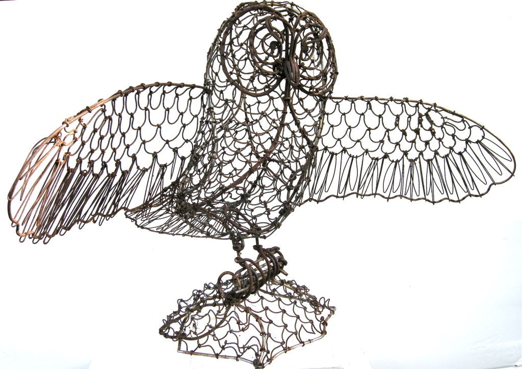 Truly charming and wonderful hand constructed wire owl.  Used originally as a scarecrow to ward off the uninvited on an early upstate NY farmstead.   It's imposing but delightful demeanor highlights its genuine Americana appeal.