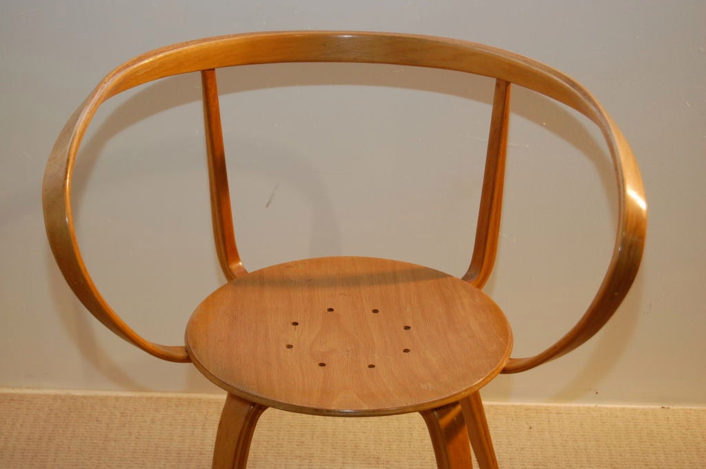 George Nelson for Herman Miller a rare Pretzel chair made of bent laminated birch ply , seat pad looks to be original pincheck Alexander Girard fabric in purple , designed in 1957 these chairs were made and sold in very limited numbers due to