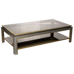 Chrome and brass coffee table signed Jean Charles