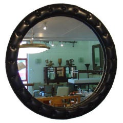 Buttoned leather framed mirror
