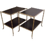 A pair of gilt metal and leather  'bamboo' sidetables