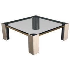 A Travertine and Brass Coffee Table