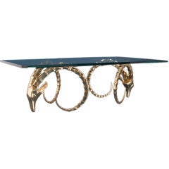 A 1960s Gilded Bronze Rams Head Based Coffee Table with Glass To