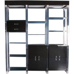 A Black Lacquer and Lucite Etagere with Glass Shelving USA 1960s