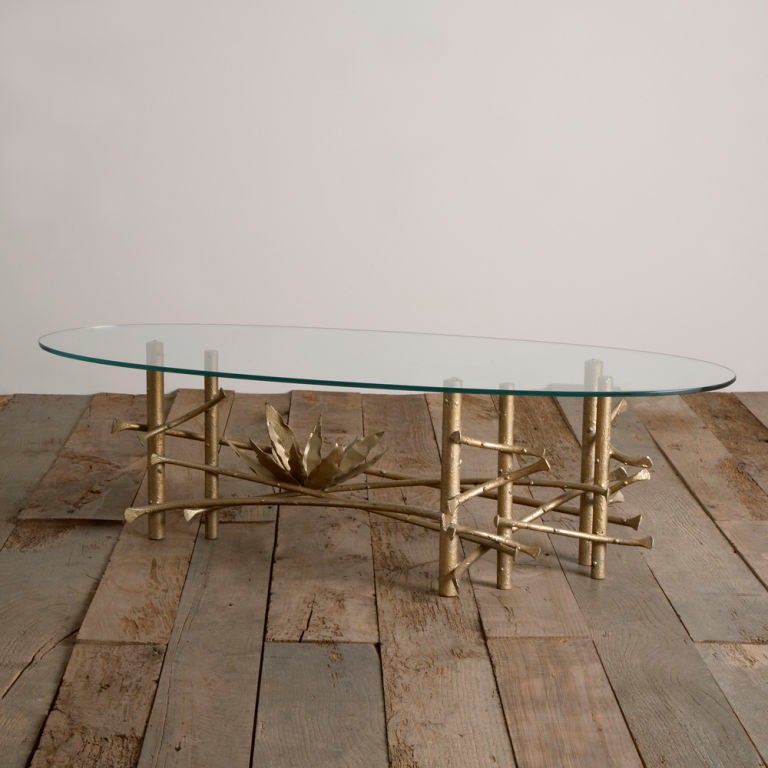 A Gold Painted Silas Seandel Style Coffee Table with Oval Glass Top 1960s