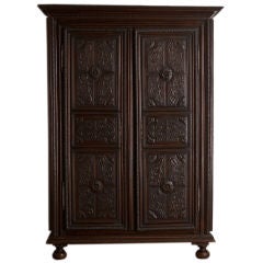 A Late 18th Century French Walnut Armoire Elaborately Carved Thr