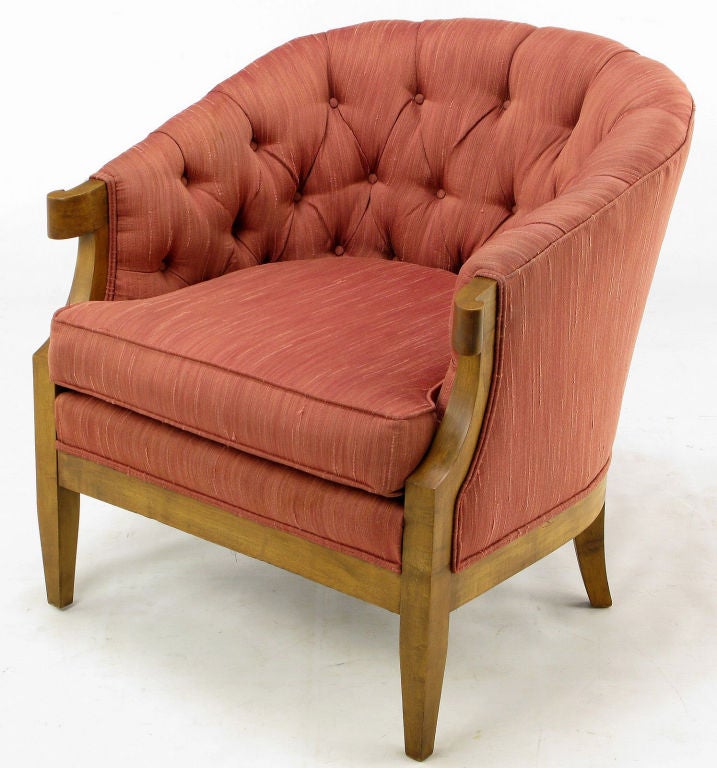 A wonderfully cared for button tufted rose silk lounge chair by Winsor White and William Millington for Baker Furniture. Rarer and slightly larger version of similarly designed turned-arm lounge chairs.