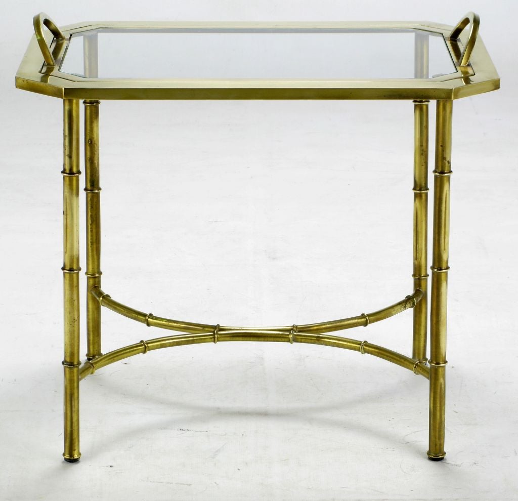 Excellent tray table in stylized brass bamboo from Mastercraft. The tray, which mirrors the canted corner top/frame, is removable for serving. The table surface height is 19.5
