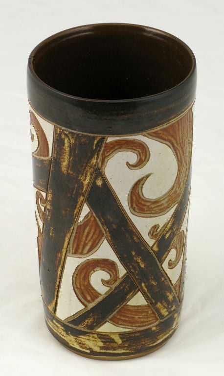Artisan glazed pottery vase in an dark chocolate geometric design with terracotta colored abstract paisley pattern. By Chicago artist Mary Seyfarth.  Signed 