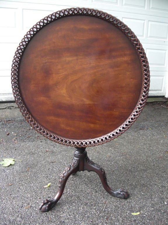 Benchmade reproduction mahogany Chippendale tilt top table