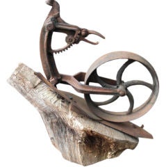 large "found object" iron sculpture of a snail by Vilma Kurzer