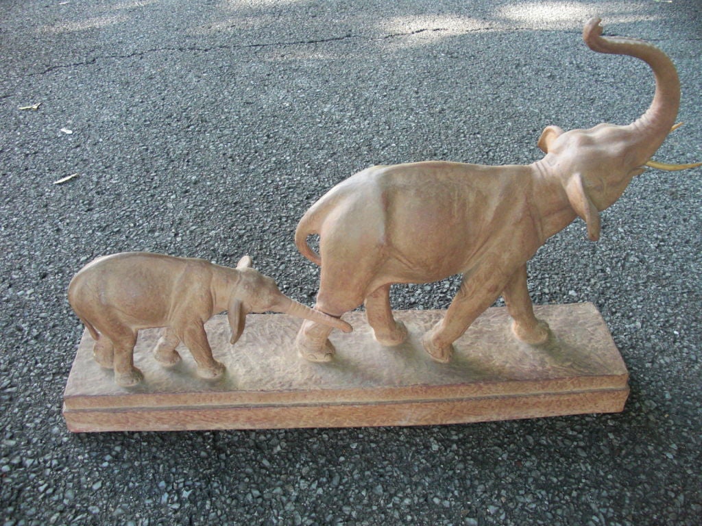An unusual terra cotta sculpture of a mother and baby elephant by important art deco Franco-Romanian sculptor Dimitri Chiparus , 1888 - 1950. Of course he is more well known for those beautiful bronze and ivory dancers but look at the charming