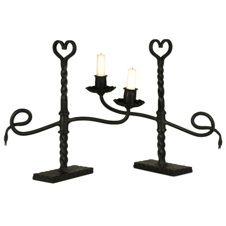 Pair of Wrought Iron Swiveling Candlesticks