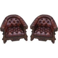 Pair of Deco Carved Wood 
Tufted Leather Armchairs