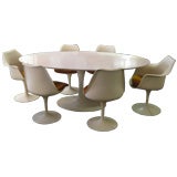 Eero Saarinen pedestal dining table for Knoll with six chairs
