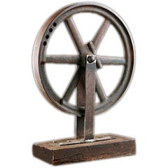 Vintage Iron Industrial Pulley on Wooden Base