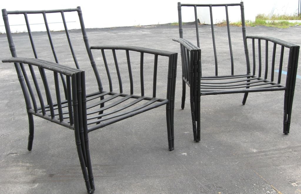 Fabulous large pair of Aluminum Faux Bamboo club chairs.Wonderful form, curved front and back legs. Can be used indoors or in the garden or patio.<br />
For additional chairs, armchairs, sofas, seating, benches, poufs, benches,