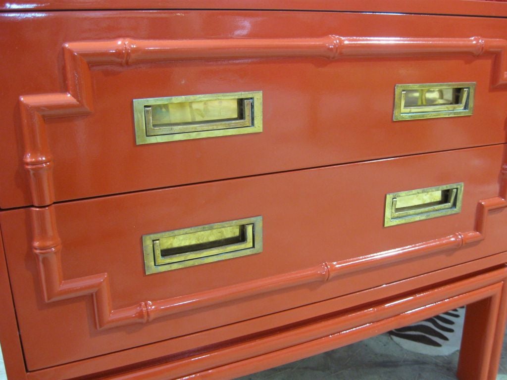 Wonderful pair campaign flair Etageres, with faux bamboo treated bases and bamboo tops, brass campaign style handles high gloss lacquered in a chinese chippendale style rich red. 2 drawers on each cabinet.<br />
For addtional chairs, armchairs,