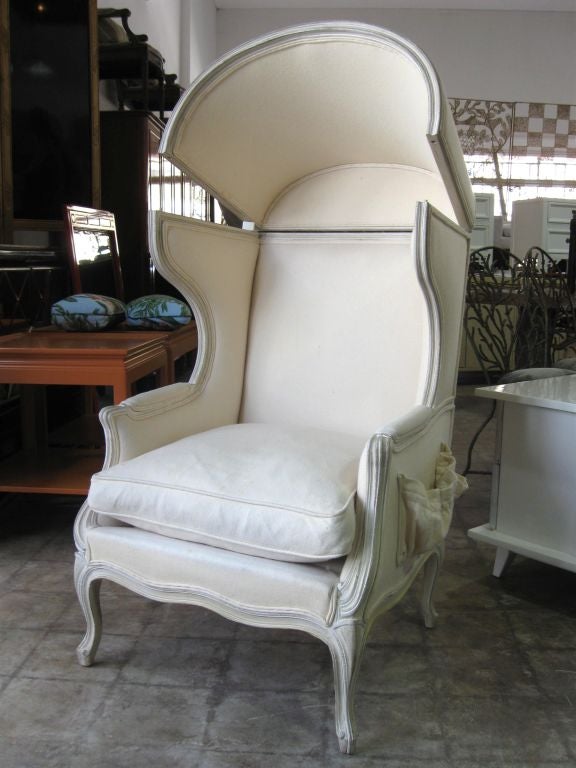 Superb French 40's, LXV Style Hooded mobile top chair, Top flips back on a hinge in order to let a large hat or doo1 sit in the chairs then flips back down.Original painted soft white finish, wonderfully comfortable, cabriole legs front and back.<br