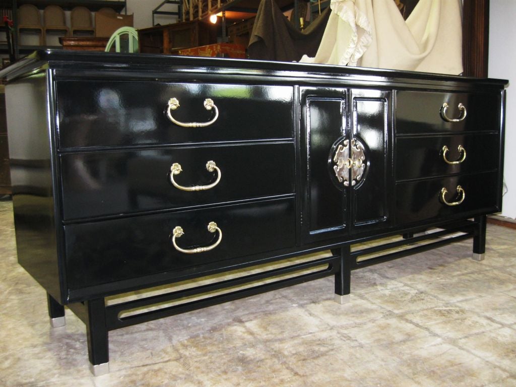 Elehgnt Hiogh Gloss Lacquered, Piano black, Shangri la style cabinet/dresser/sideboard. Clean lines, chic stretcher base, nice quality cabinetery.<br />
For additional commodes, bureaus, desk, credenzas, consoles, dressers,