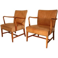 An original pair of Danish armchairs designed by Dorty Dyrlund